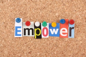 The word Empower in magazine letters on a notice board